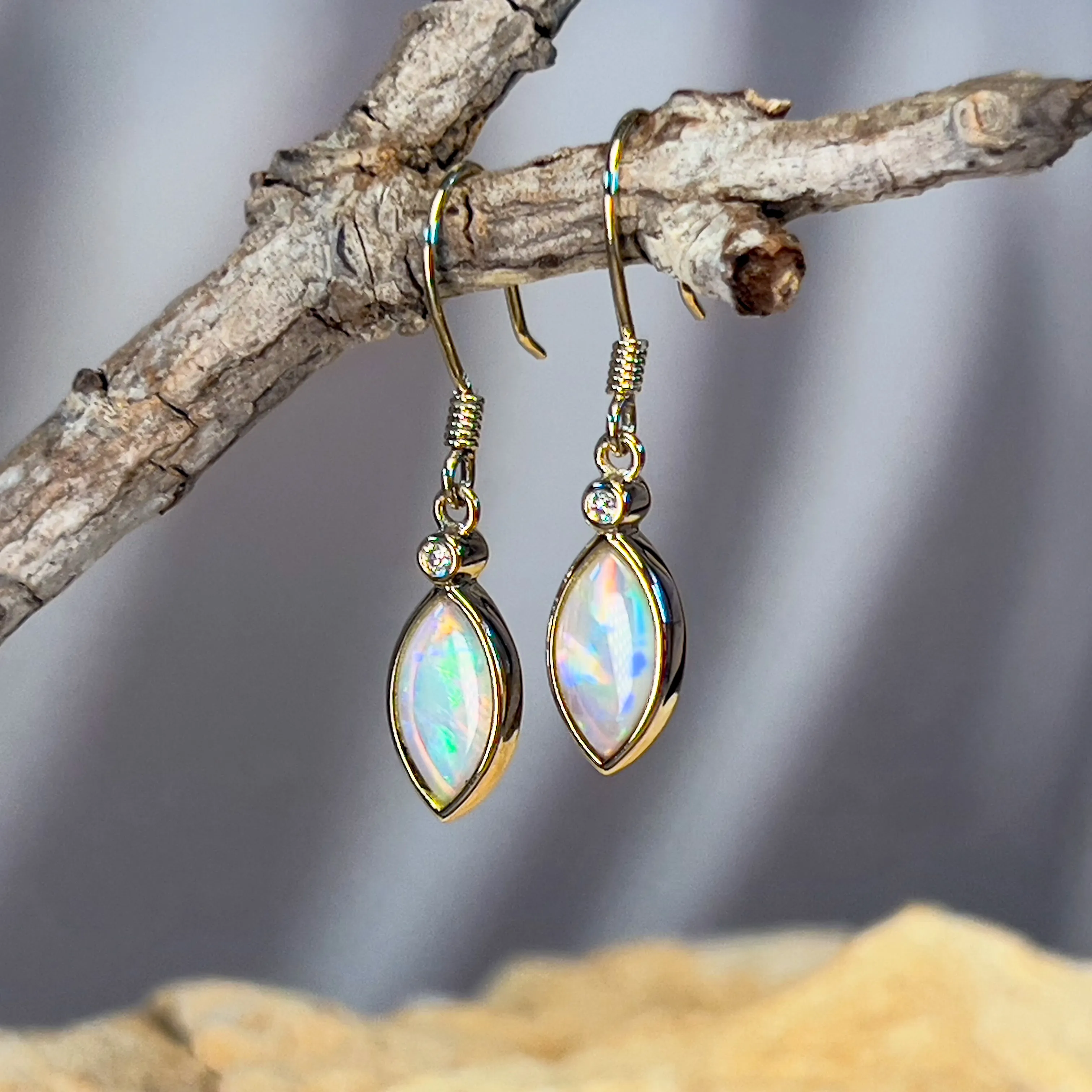 14kt Yellow Gold dangling Marquise shape Crystal Opal earrings