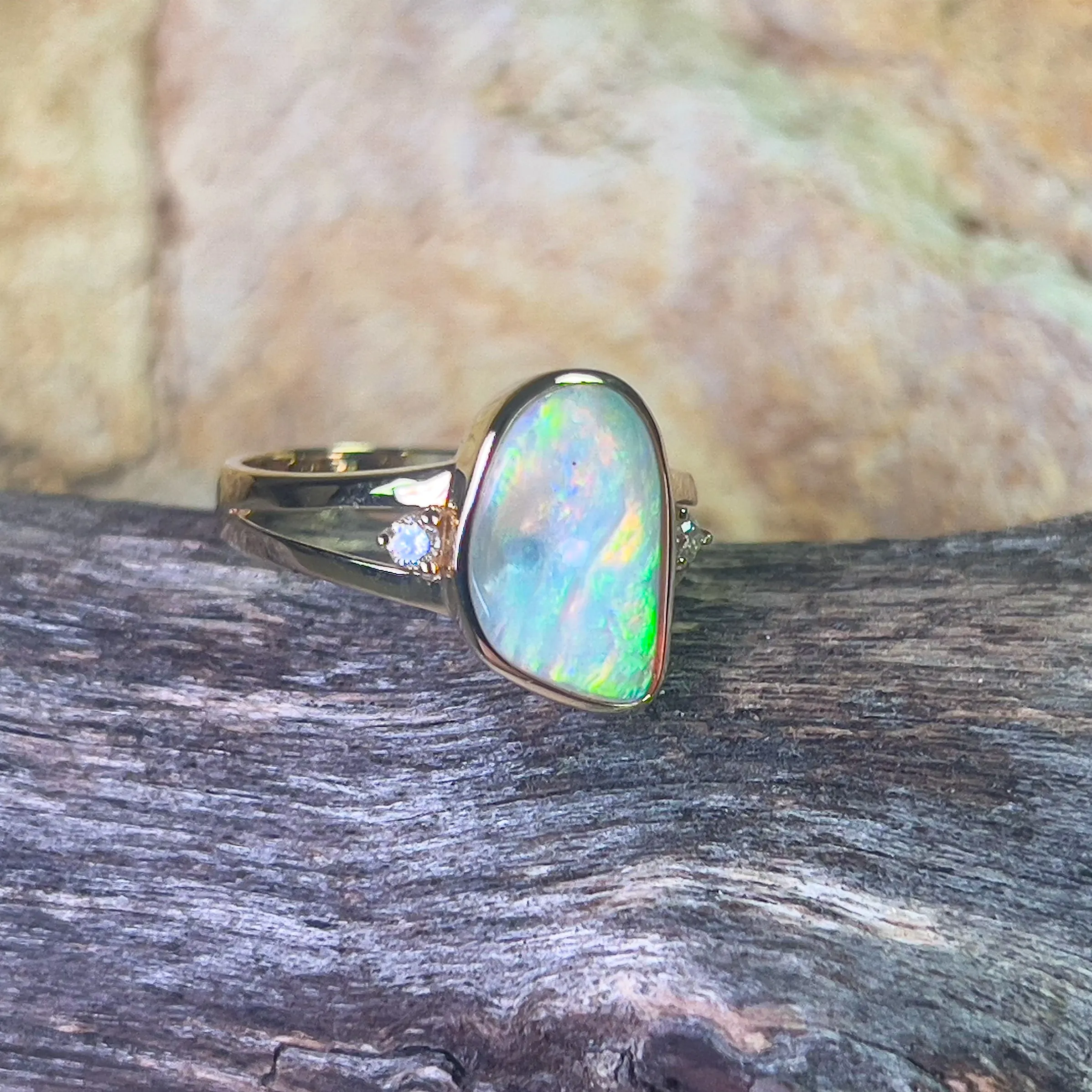 14kt Yellow gold freeform 1.53ct Crystal Opal and diamond ring