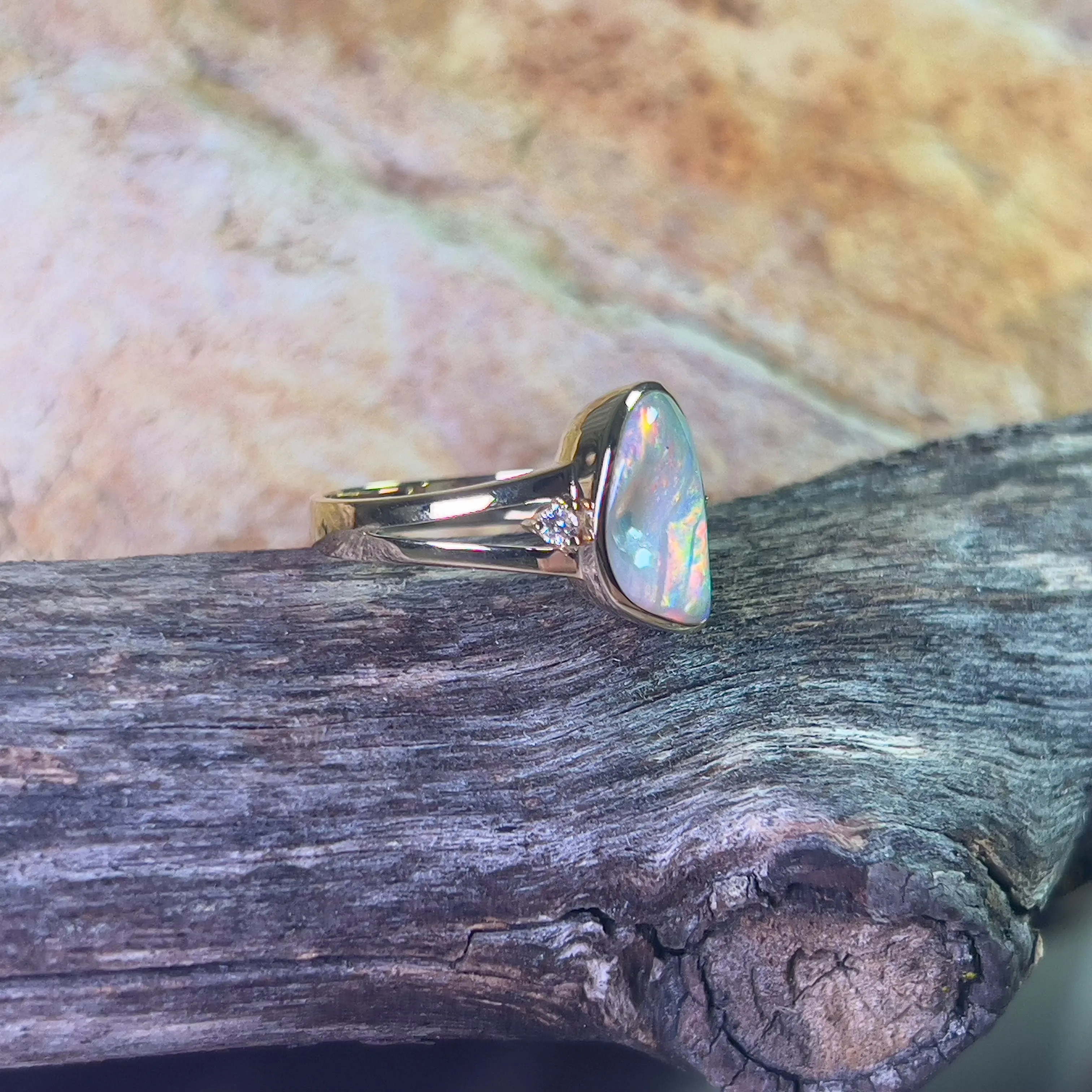 14kt Yellow gold freeform 1.53ct Crystal Opal and diamond ring