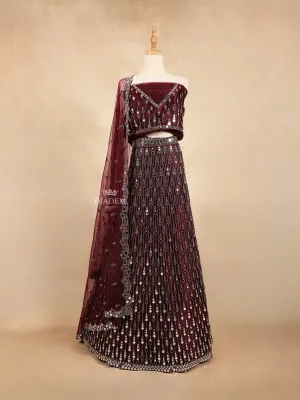 Burgundy Raw Silk Semi-Stitched Lehenga Embellished with Mirrorwork Paired with Net Dupatta