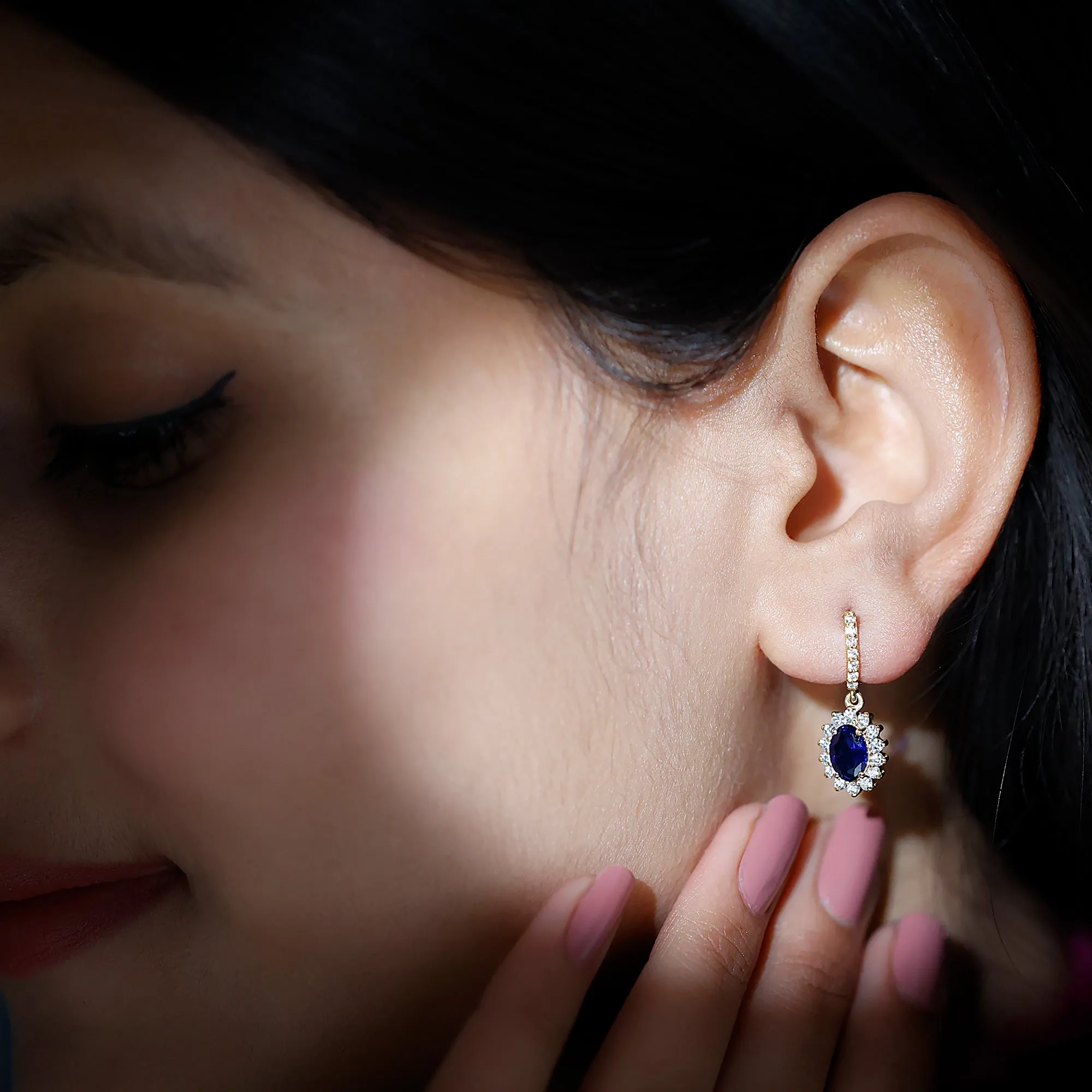 Oval Created Blue Sapphire J Hoop Earrings with Moissanite Halo